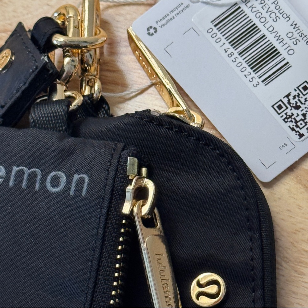 NWT Lululemon Dual Pouch Wristlet Black Gold Wordmark NWT - Picture 3 of 7